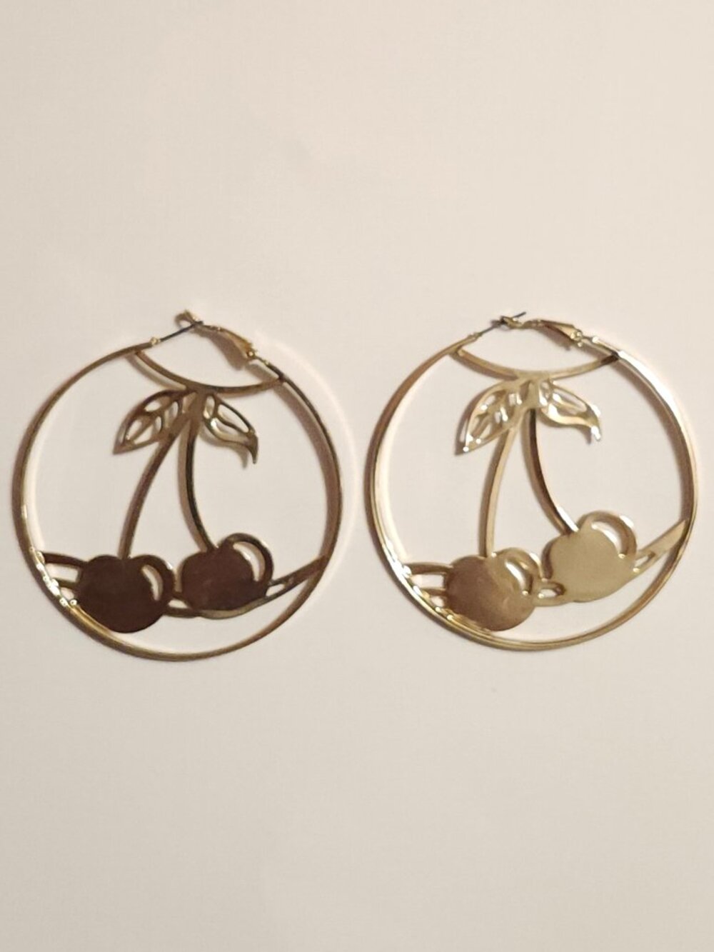Hot Topic Cherry Gold Hoop Earrings feature a Cherry design in a 2-inch